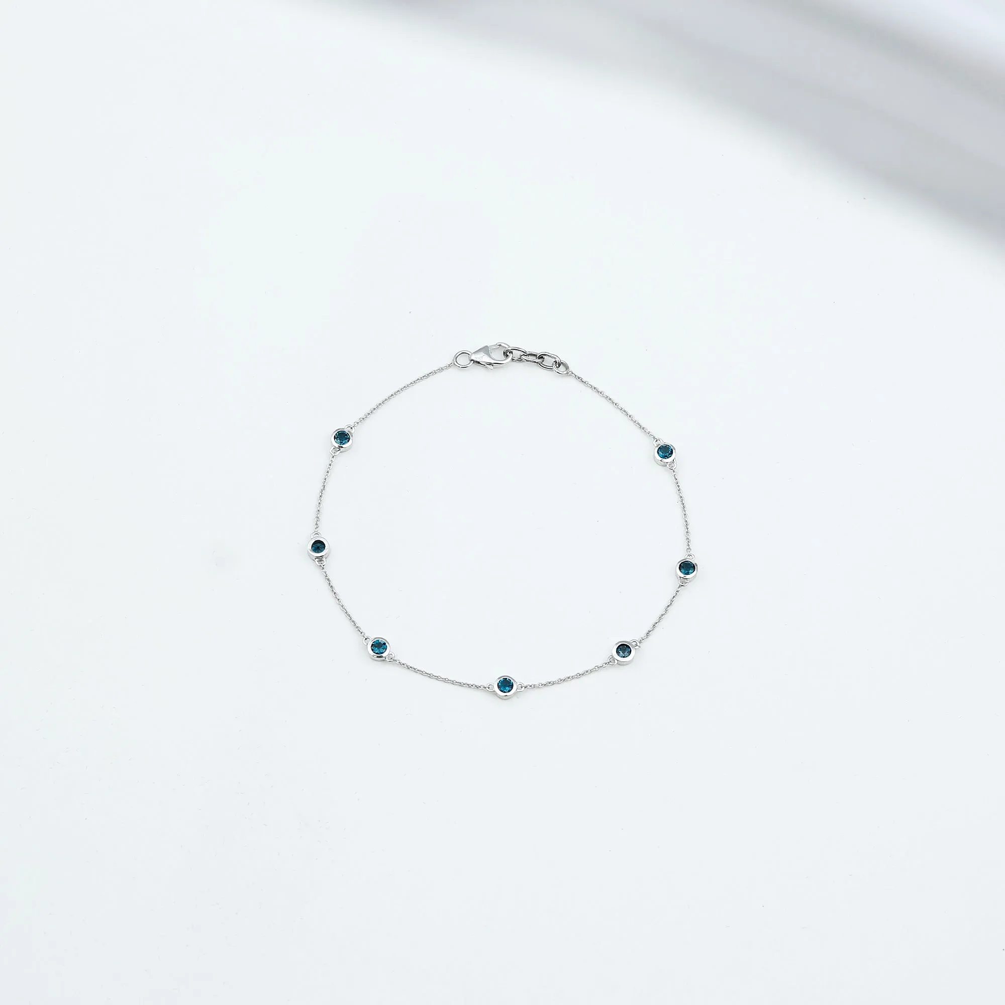 1.25 CT Bezel Set London Blue Topaz Seven Stone Station Chain Bracelet