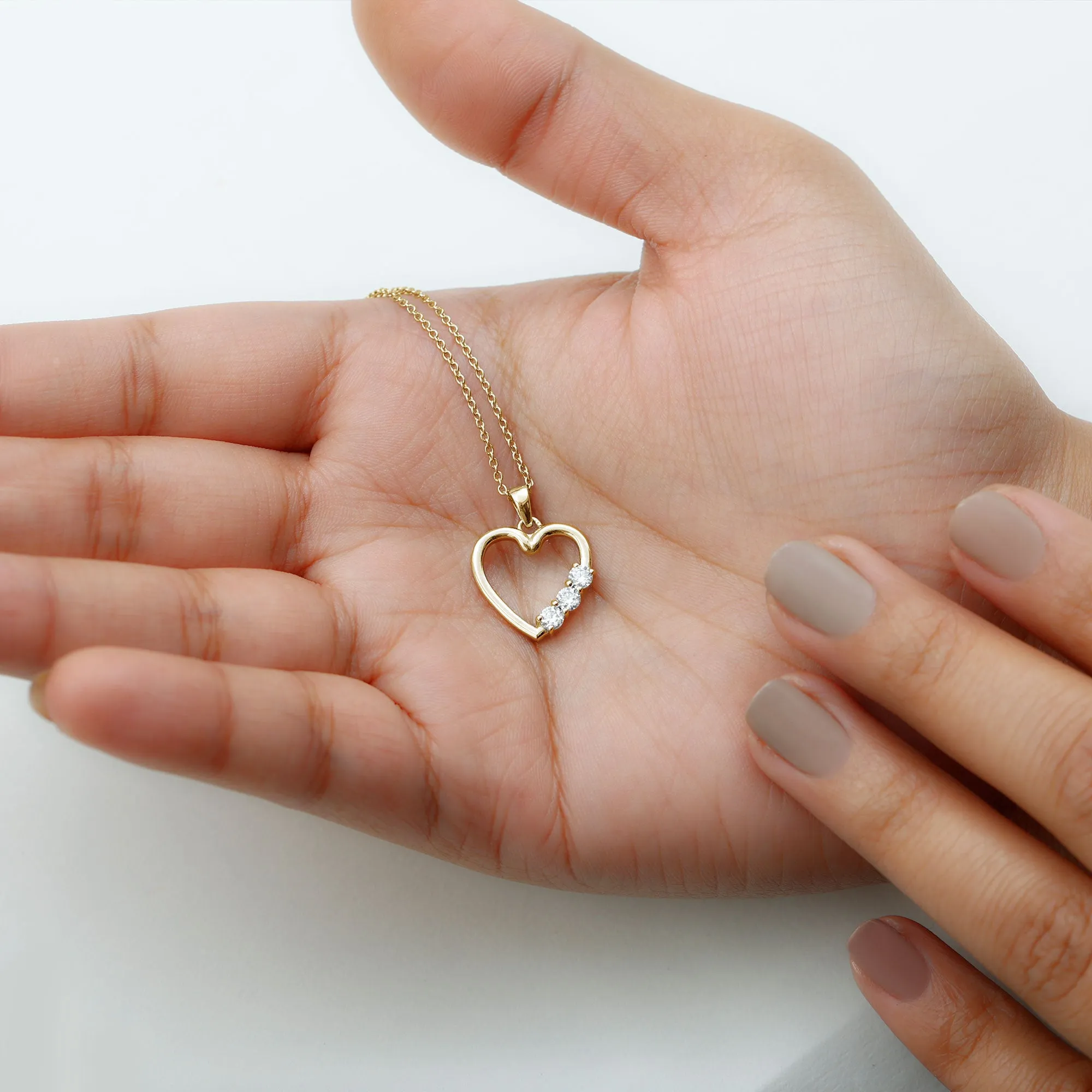 1/4 CT Simple Moissanite and Gold Heart Pendant