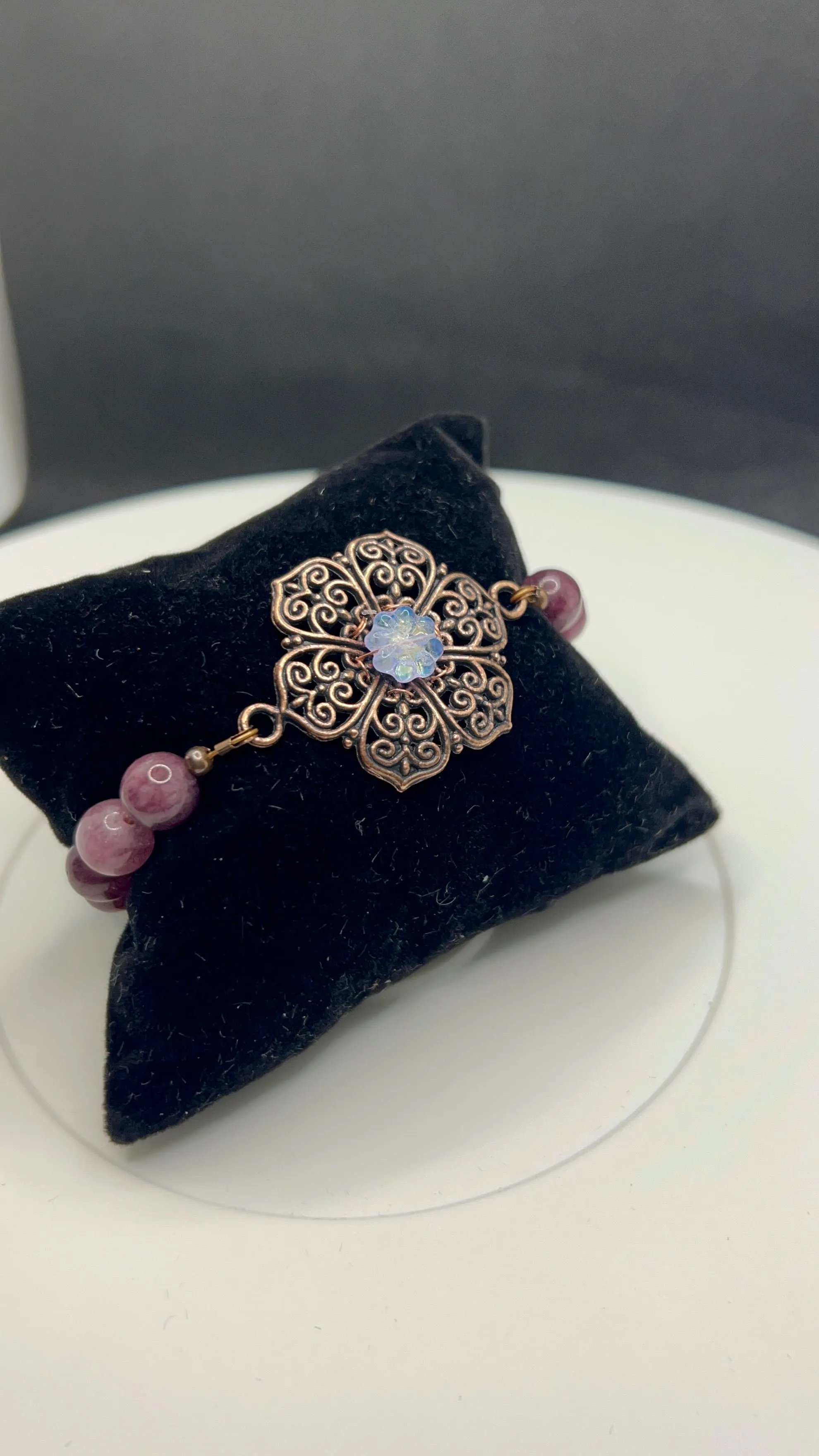 Amethyst Colored Beads with Antique Copper Filigree Flower Pendant Bracelet