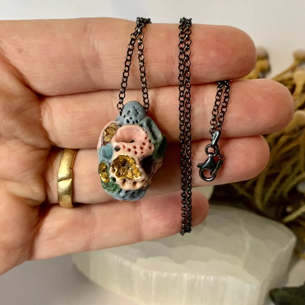 Coloured ‘rock coral’ pod pendant on oxidised sterling silver chain