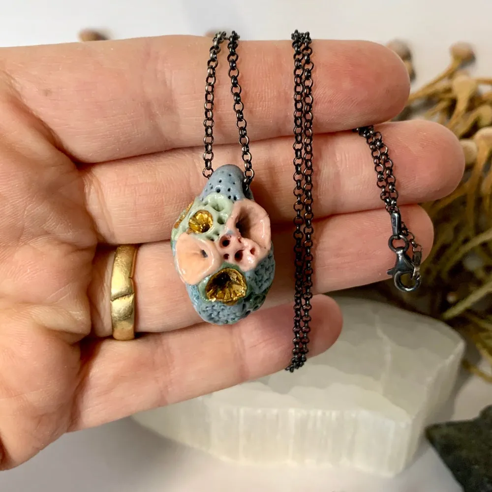 Coloured ‘rock coral’ pod pendant on oxidised sterling silver chain