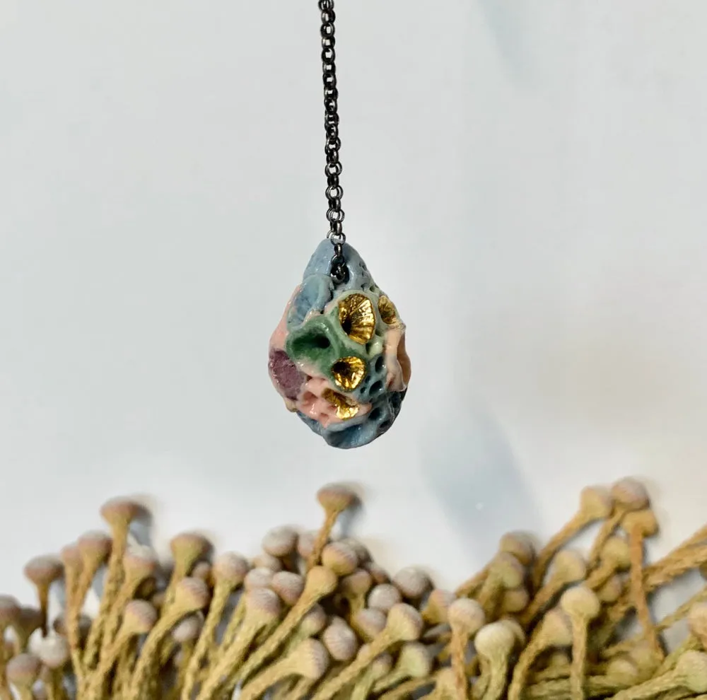 Coloured ‘rock coral’ pod pendant on oxidised sterling silver chain