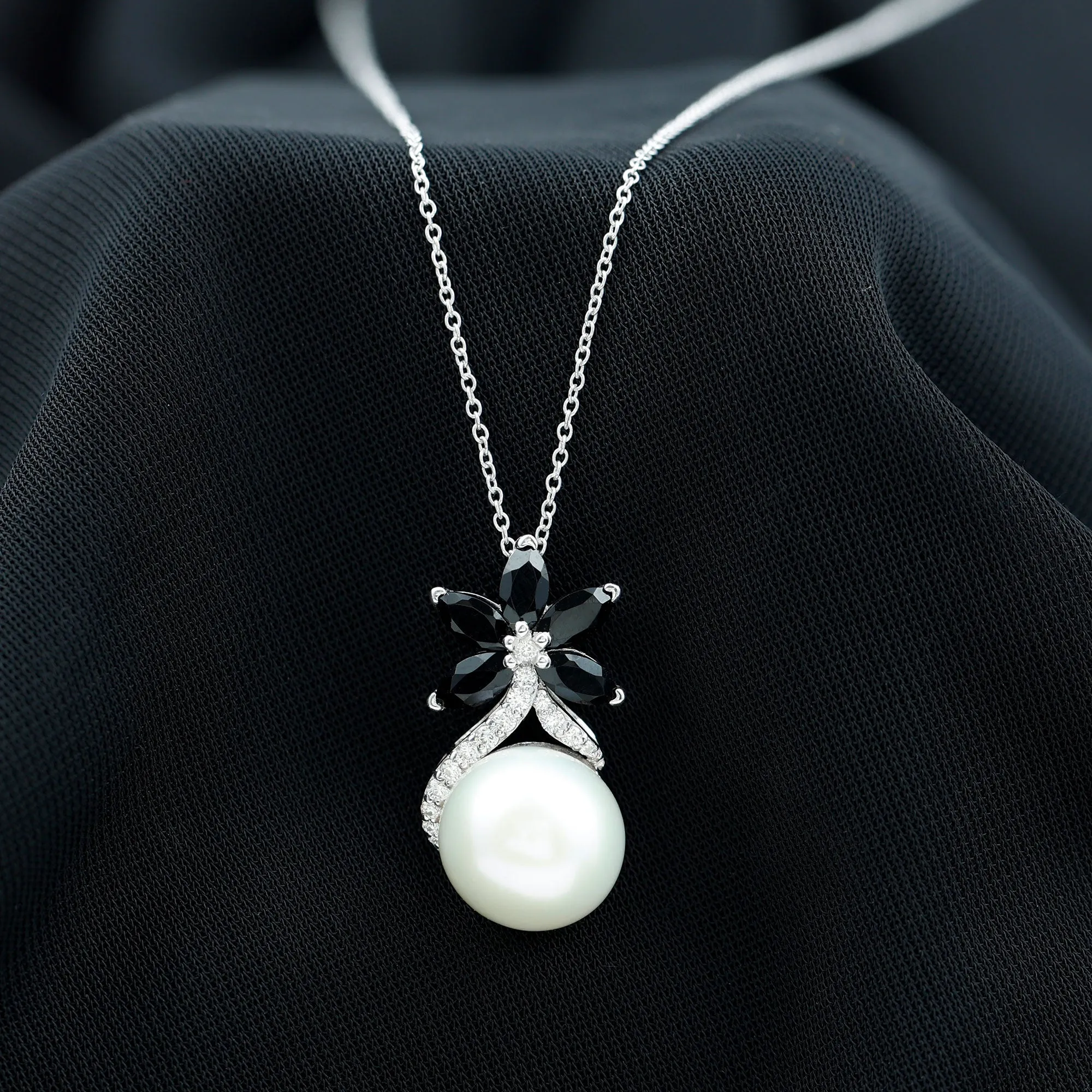 Floral Inspired Freshwater Pearl and Black Onyx Pendant with Moissanite Accent