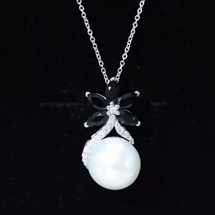 Floral Inspired Freshwater Pearl and Black Onyx Pendant with Moissanite Accent