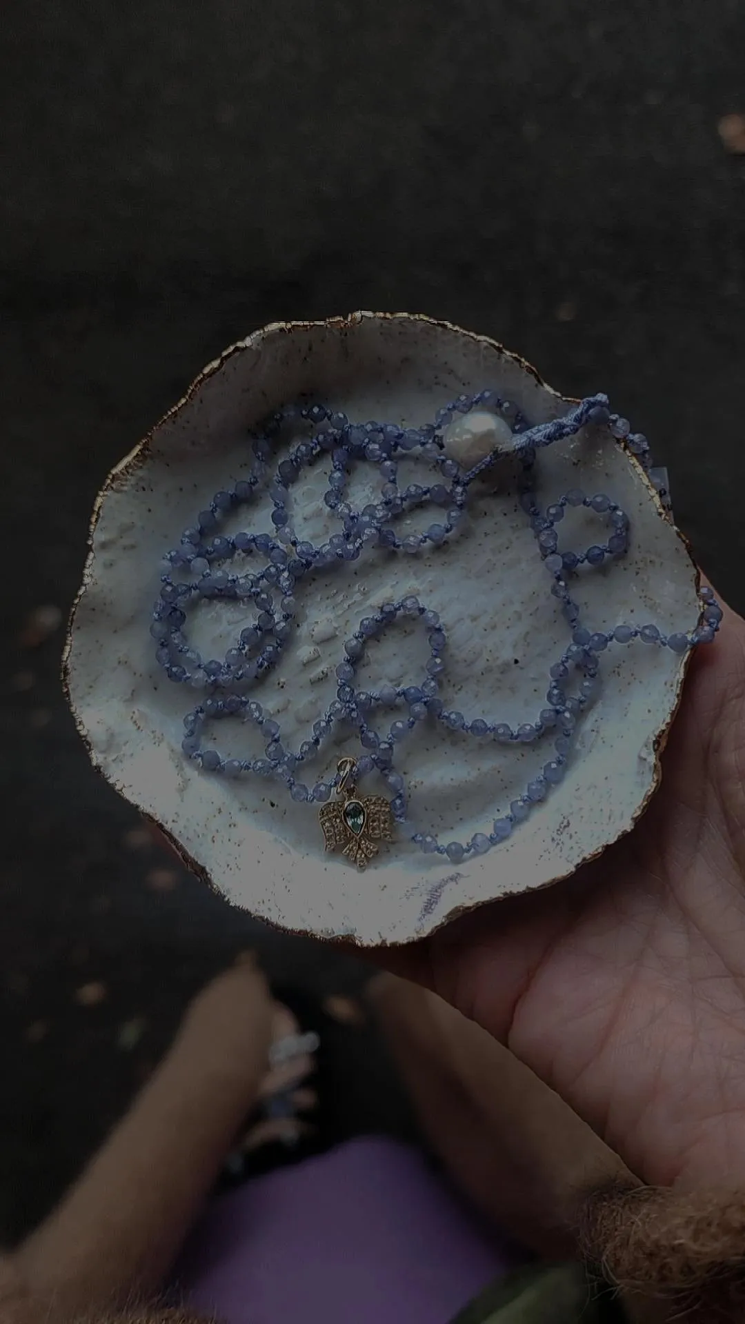 Hand knotted Tanzanite Necklace with Gold Bird