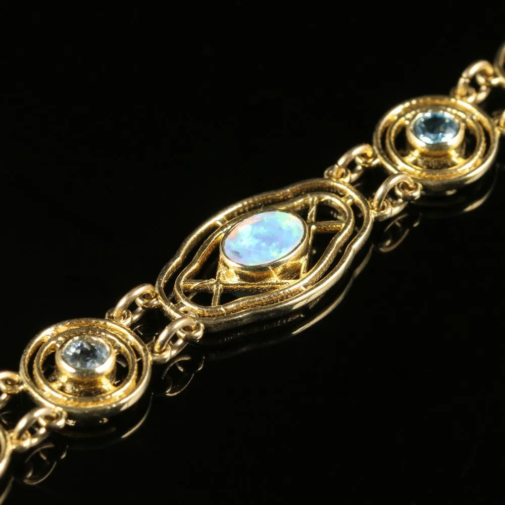Opal Blue Topaz Bracelet 9Ct Yellow Gold