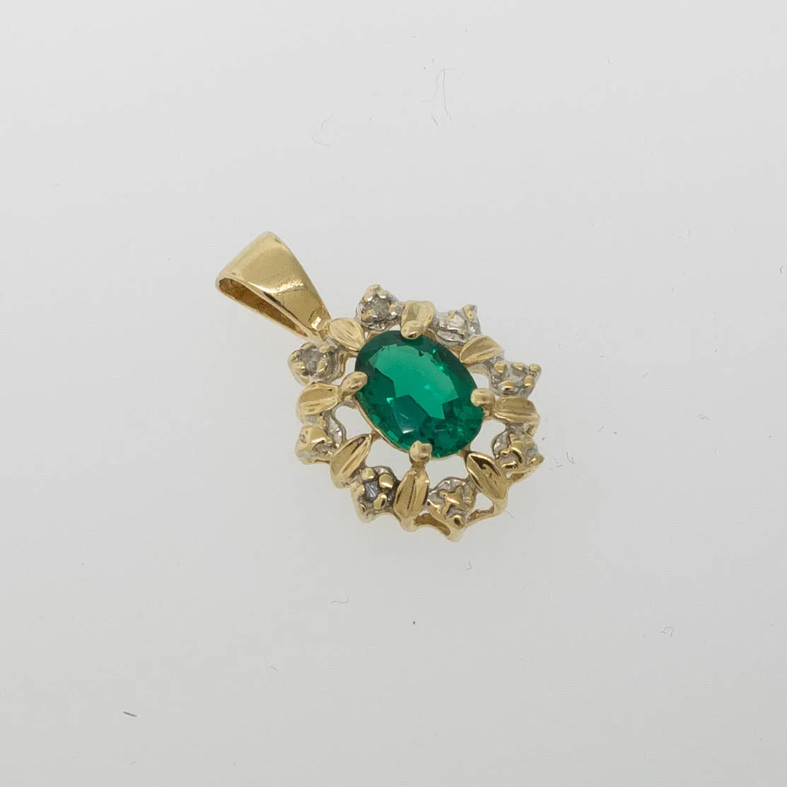 Preowned 14K Yellow Gold Pendant with Oval Synthetic Green Stone and Diamonds