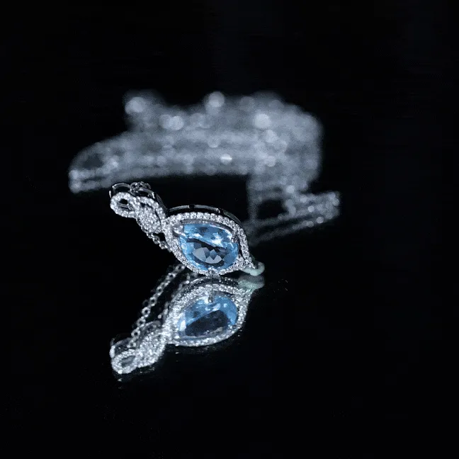 Swiss Blue Topaz Teardrop Dangle Pendant with Moissanite Accent