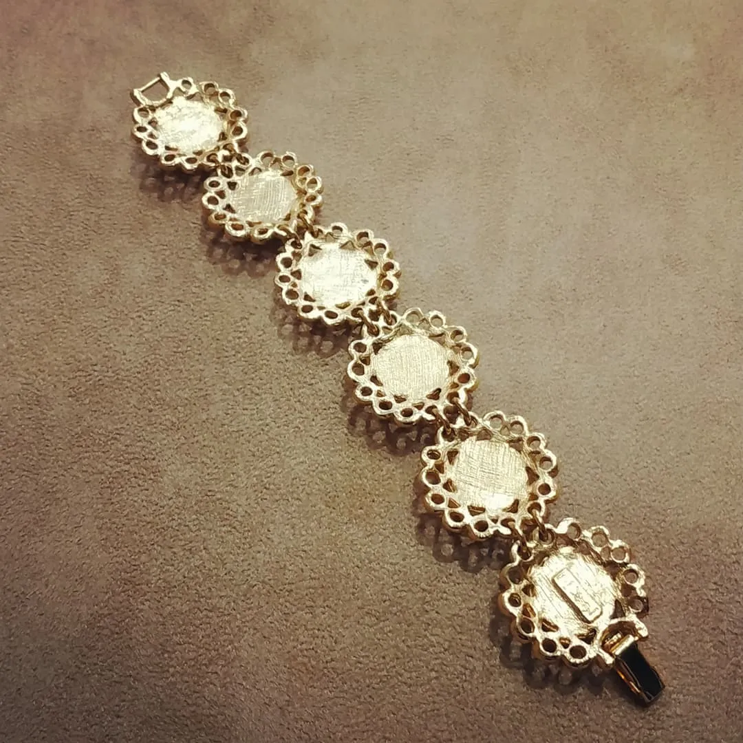 Yves Saint Laurent golden floral pearl bracelet