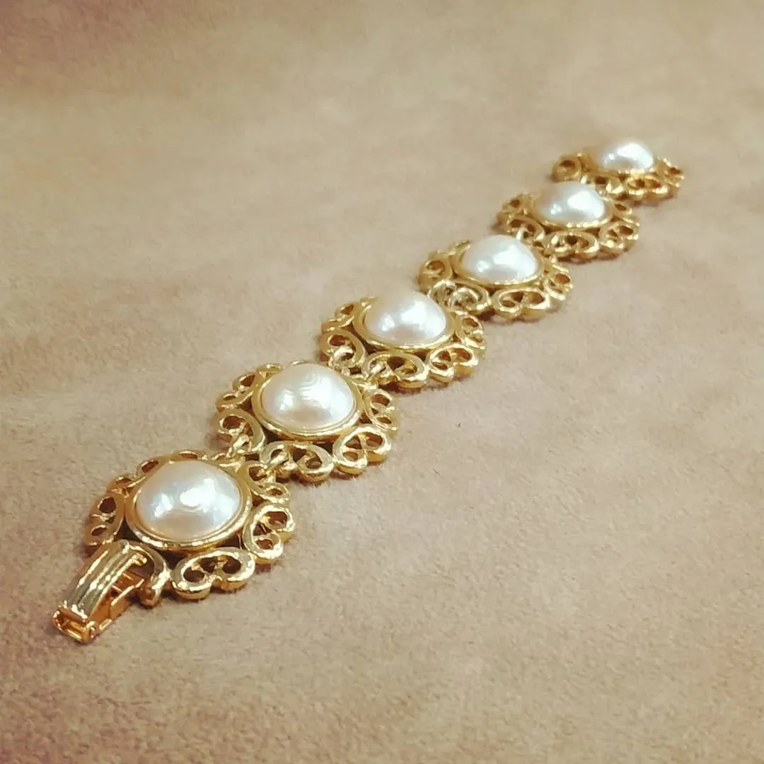 Yves Saint Laurent golden floral pearl bracelet